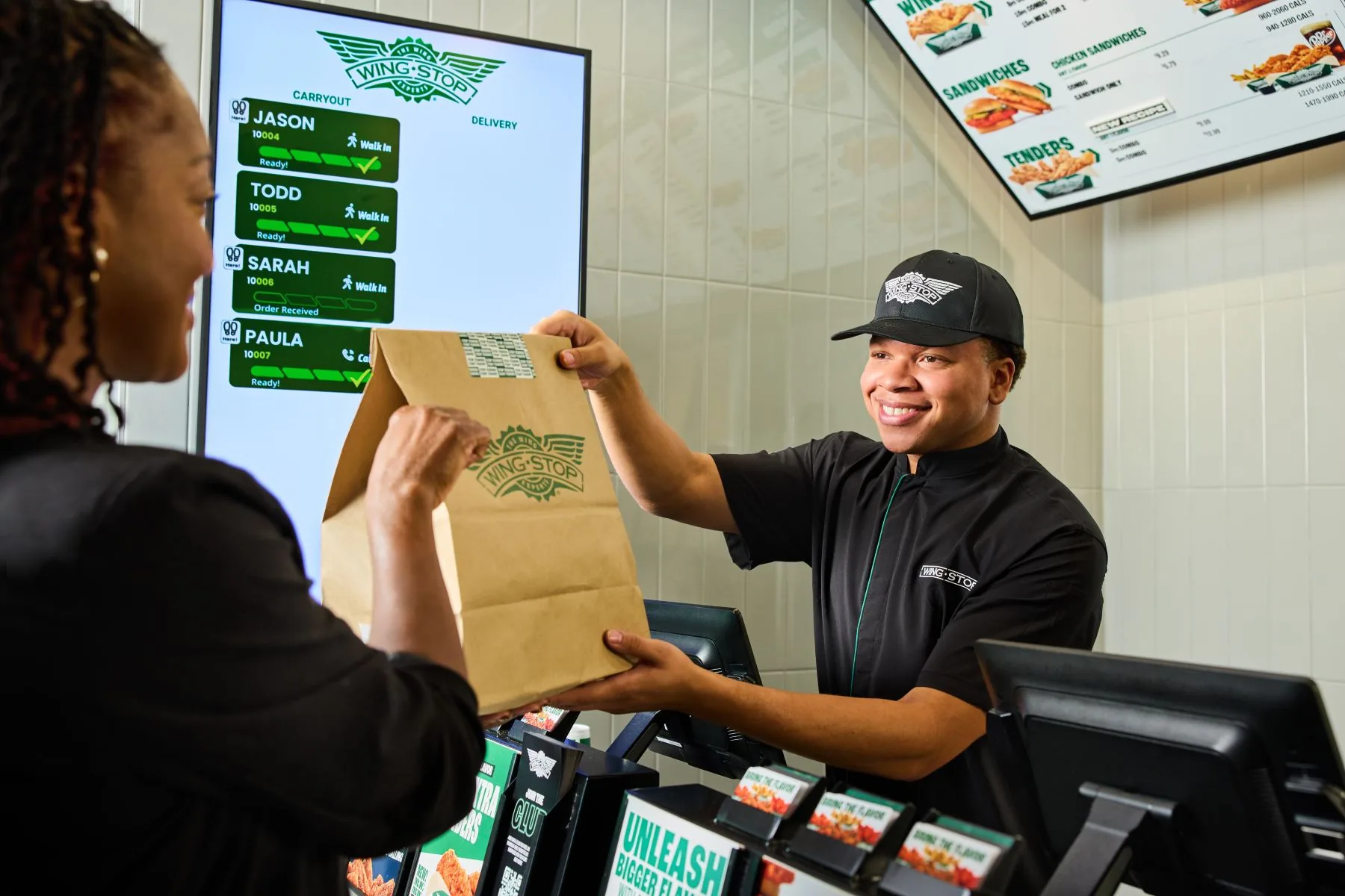 Official Wingstop order handoff photograph